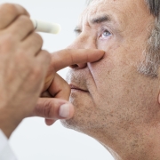 Elderly man examined by an ophthalmologist